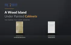 A Wood Island Under Painted Cabinets