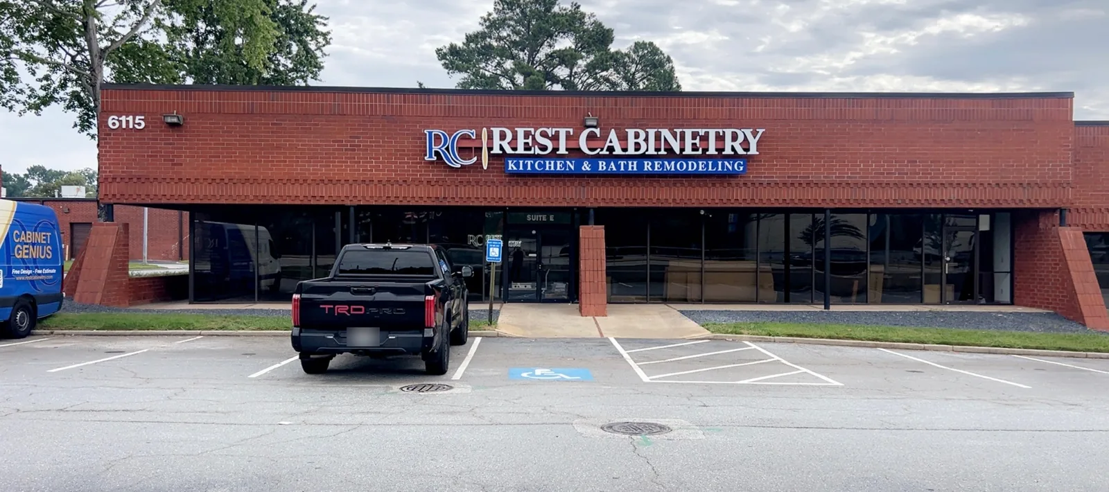 Rest Cabinetry showroom and warehouse at 6115 Jimmy Carter Blvd, Suite E, Norcross, GA, with the Kitchen & Bath Remodeling sign over the entrance